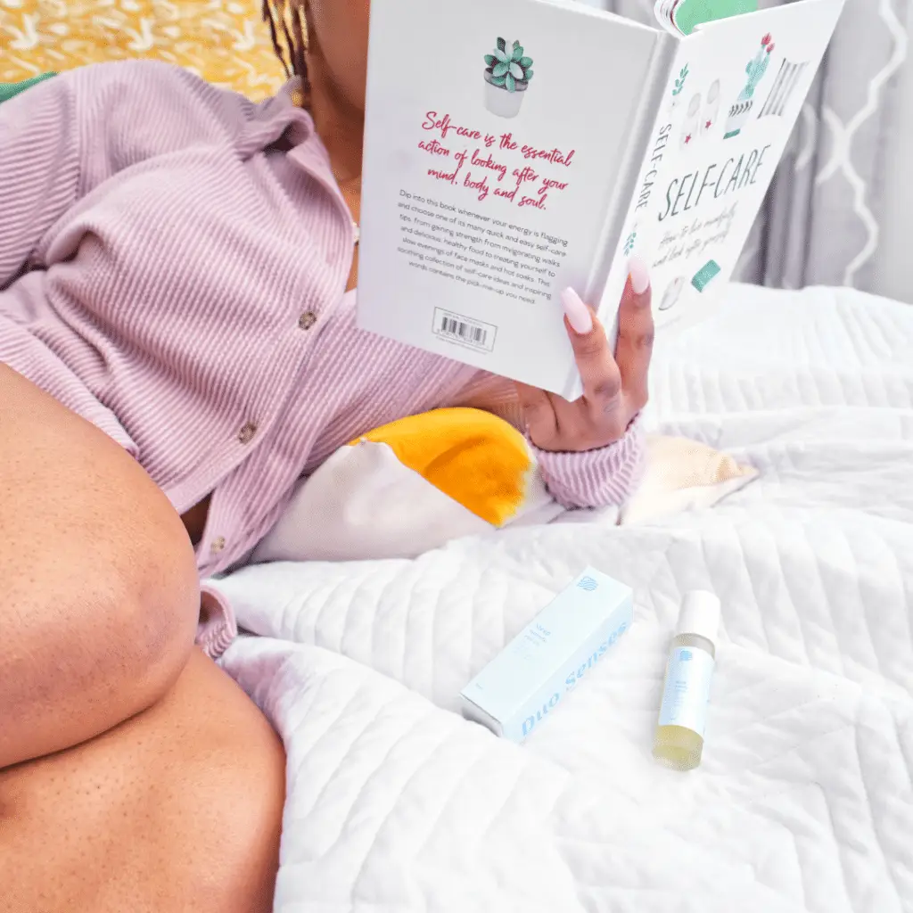 Duo Senses sleep CBD aromatherapy roll-on with lavender and chamomile essential oils on bed